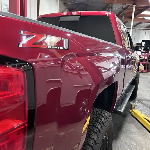 Chevrolet Silverado Z71 off road diesel pickup receiving suspension and repair service at Rapid Diesel Repair